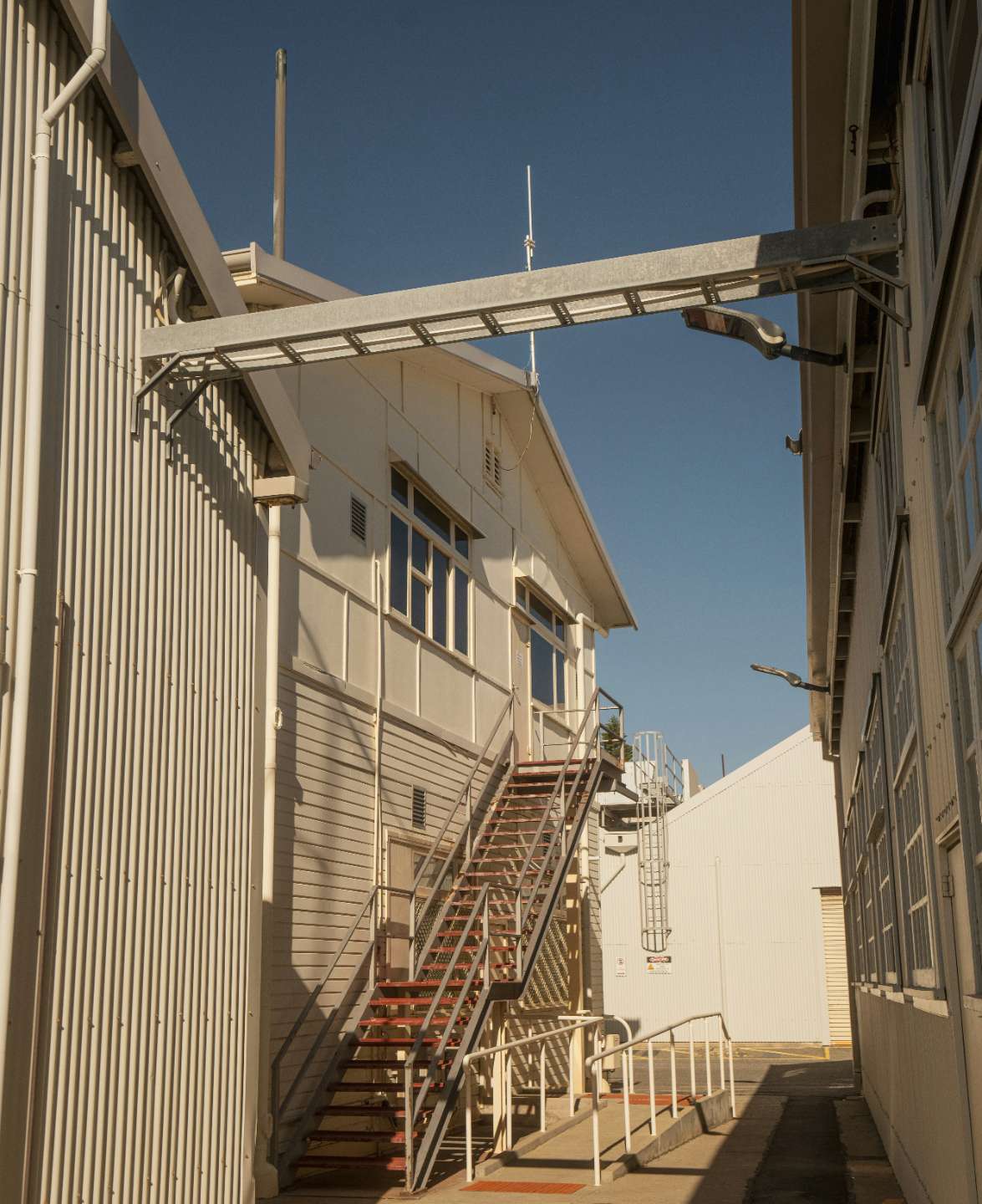 A drone cleaning an industrial building