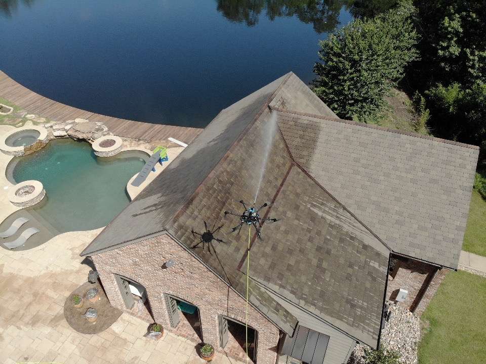 A drone cleaning a commercial building